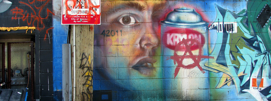 Public art in an alley adjacent to Commercial Drive in Vancouver BC Canada.