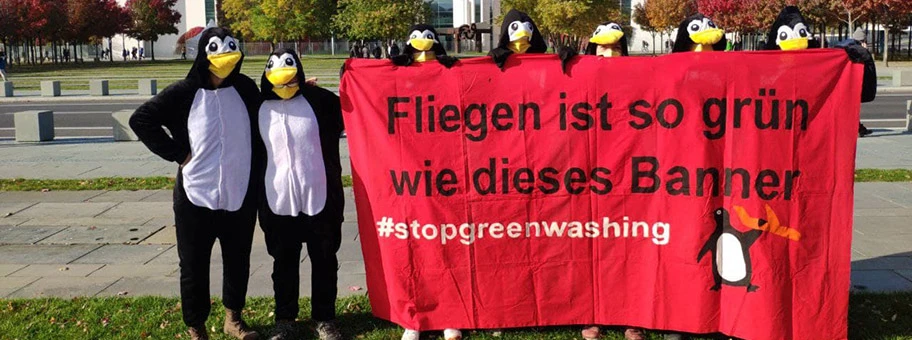 Aktion gegen Greenwashing in Berlin, November 2021.