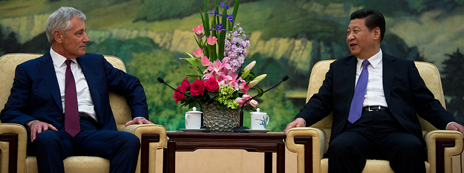 Chinas Staatschef Xi Jinping mit dem US-Verteidigungsminister Chuck Hagel in Peking.