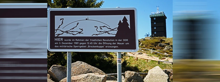 Hinweis zur Erinnerung an die deutsche Wiedervereinigung auf dem Brocken (Harz).