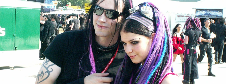 Young man and young woman at M'era Luna Festival.