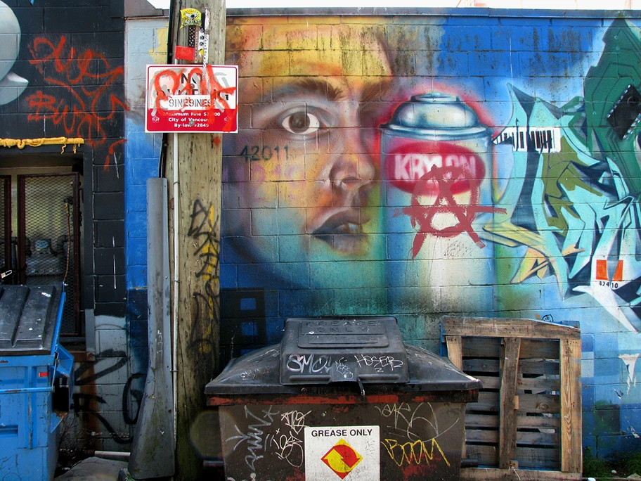 Public art in an alley adjacent to Commercial Drive in Vancouver BC Canada.