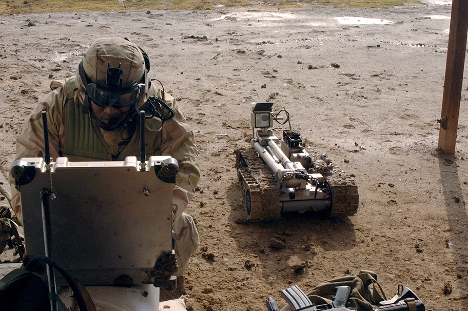 Military robot being prepared to inspect a bomb.