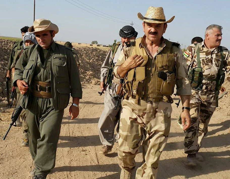 Kämpfer der kurdischen PKK und Soldaten der PUK Peschmerga in Kirkuk.