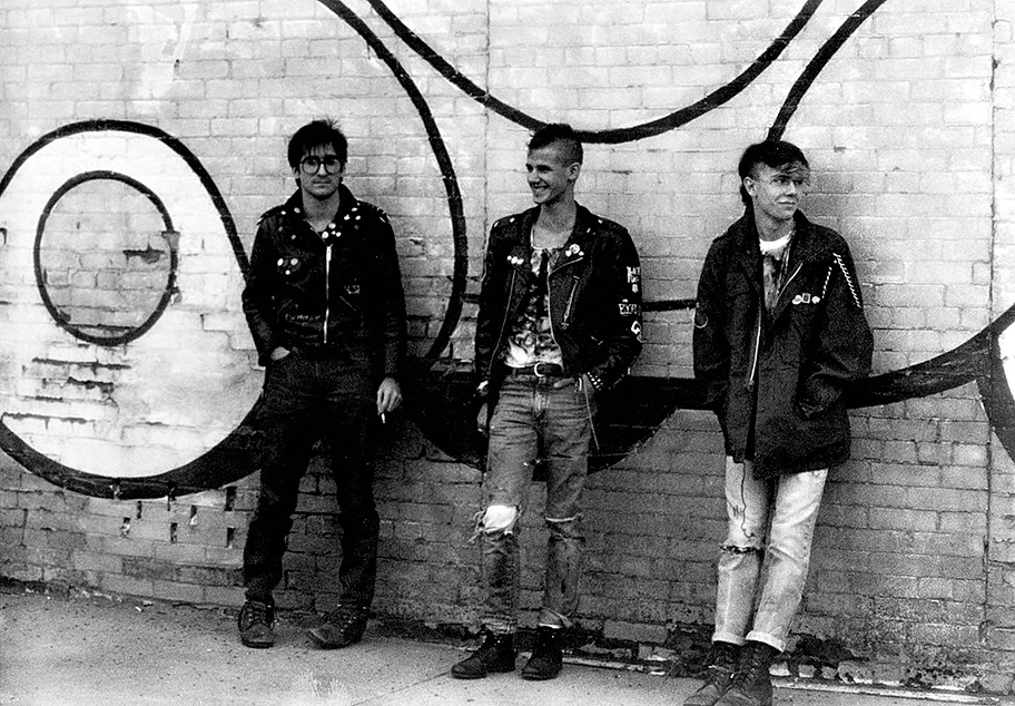 Punks_on_brick_wall_c1984_w.webp