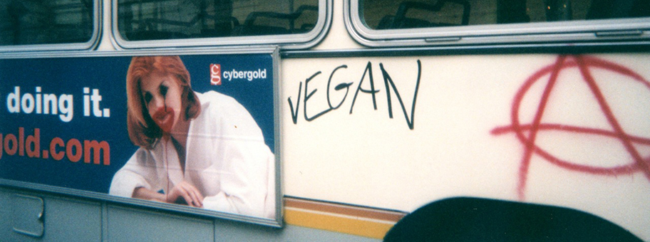 Vandalism of a local Seattle Metro bus during the 1999 WTO protests in Seattle.