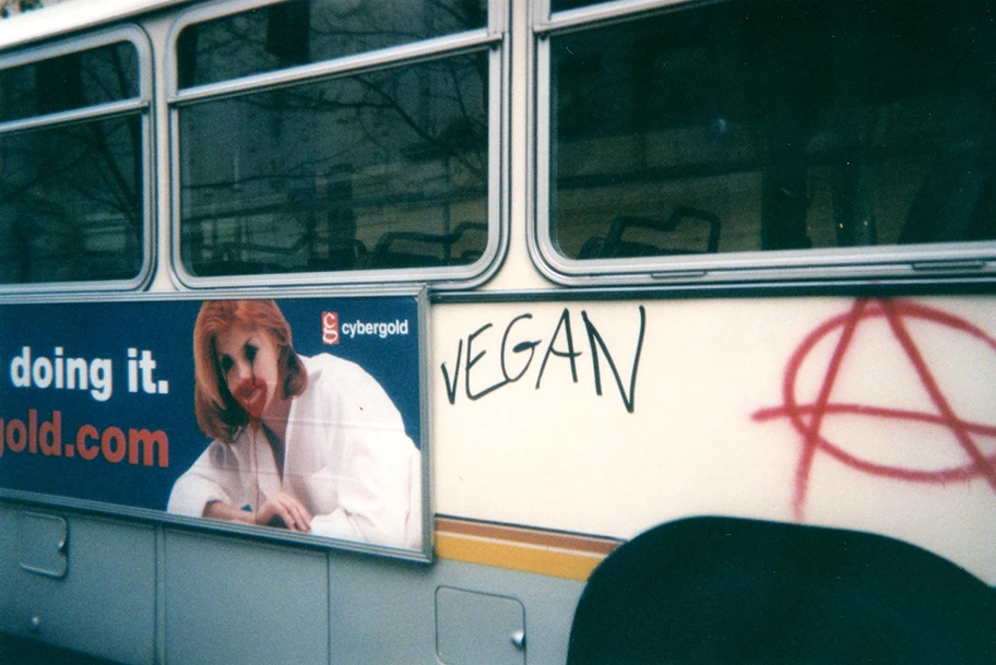 Vandalism of a local Seattle Metro bus during the 1999 WTO protests in Seattle.