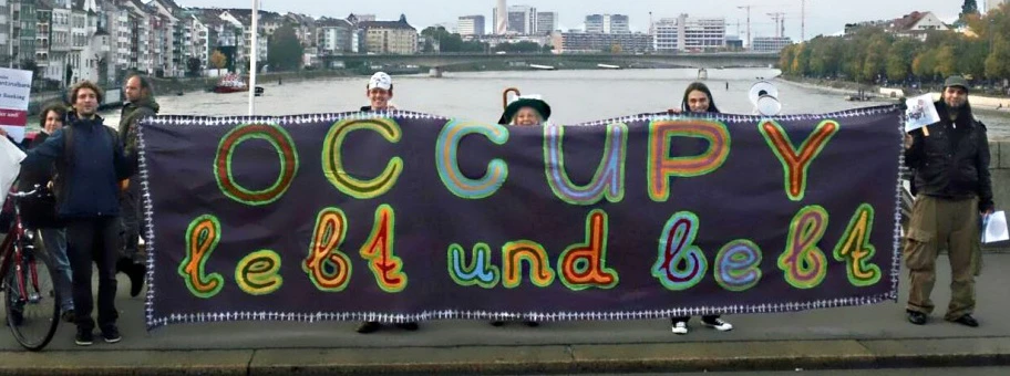 Occupy Basel fordert wirkungsvolles Bankgesetz und droht mit Referendum